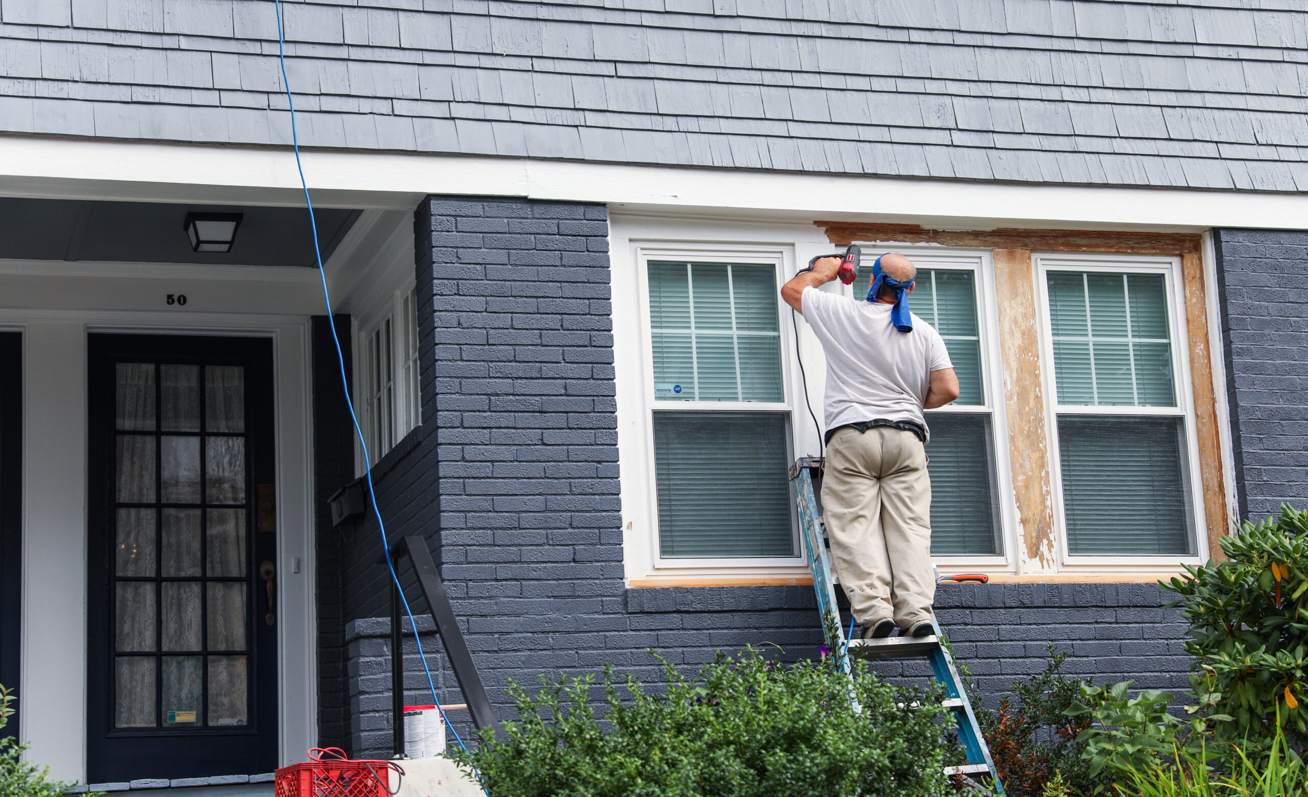 construction-workers-hardhats-vests-busy-construction-site-operating-machinery-buil